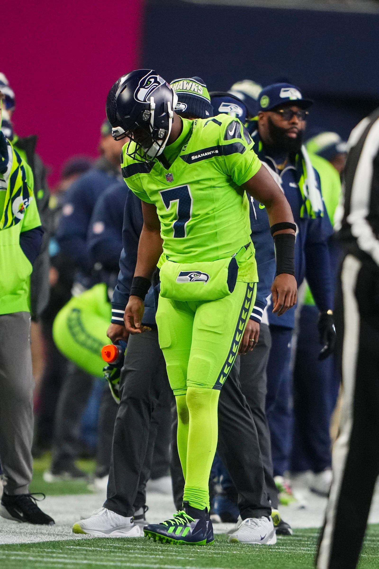 Seattle Seahawks' Geno Smith is hurt during the second half of an NFL football game against the Green Bay Packers Sunday, Dec. 15, 2024, in Seattle. (AP Photo/Lindsey Wasson)