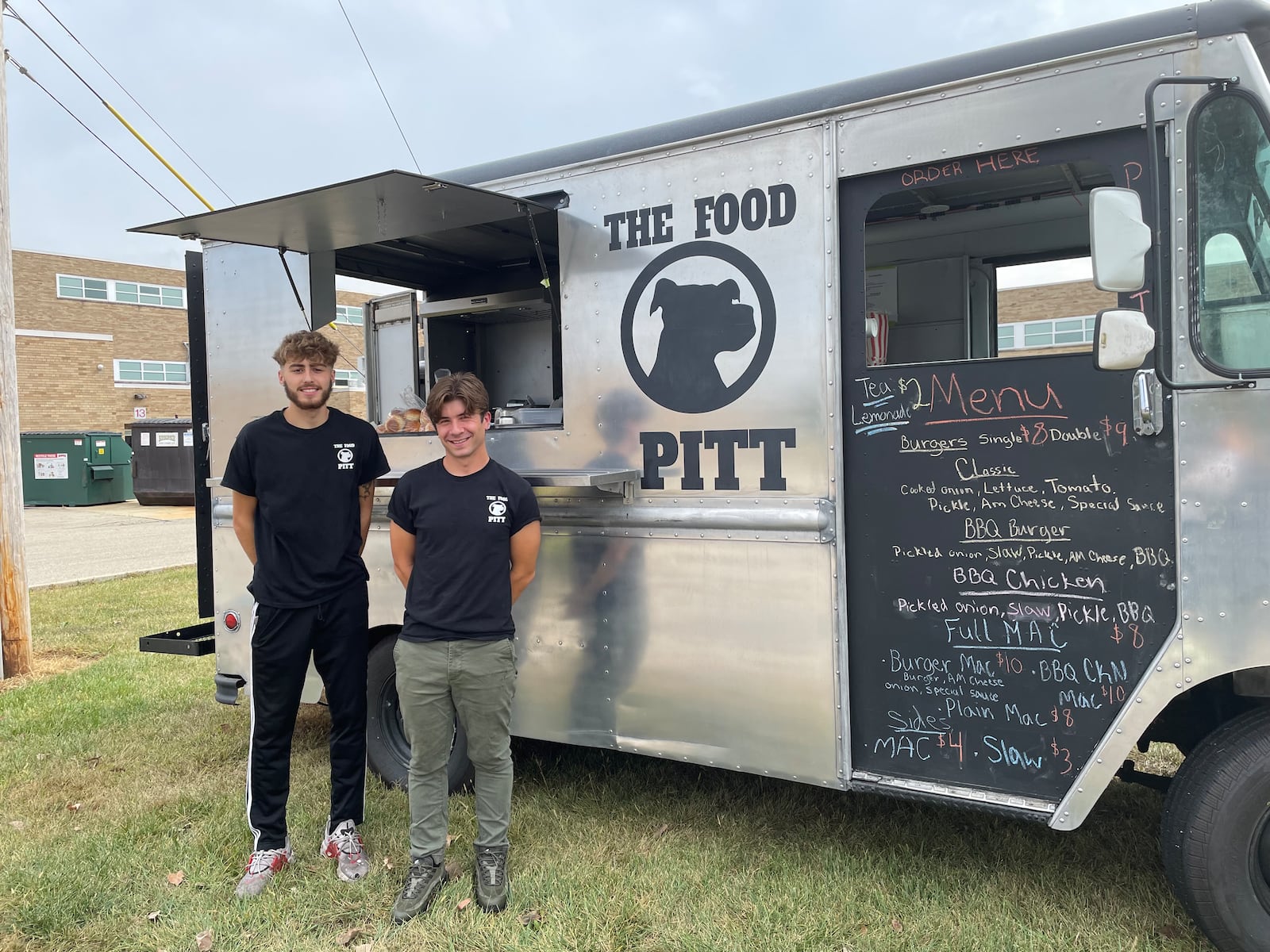 Northridge graduates, Austin Warman and Justin Hamilton, have opened The Food Pit, a food truck serving smash burgers, homemade mac and cheese and more. NATALIE JONES/STAFF