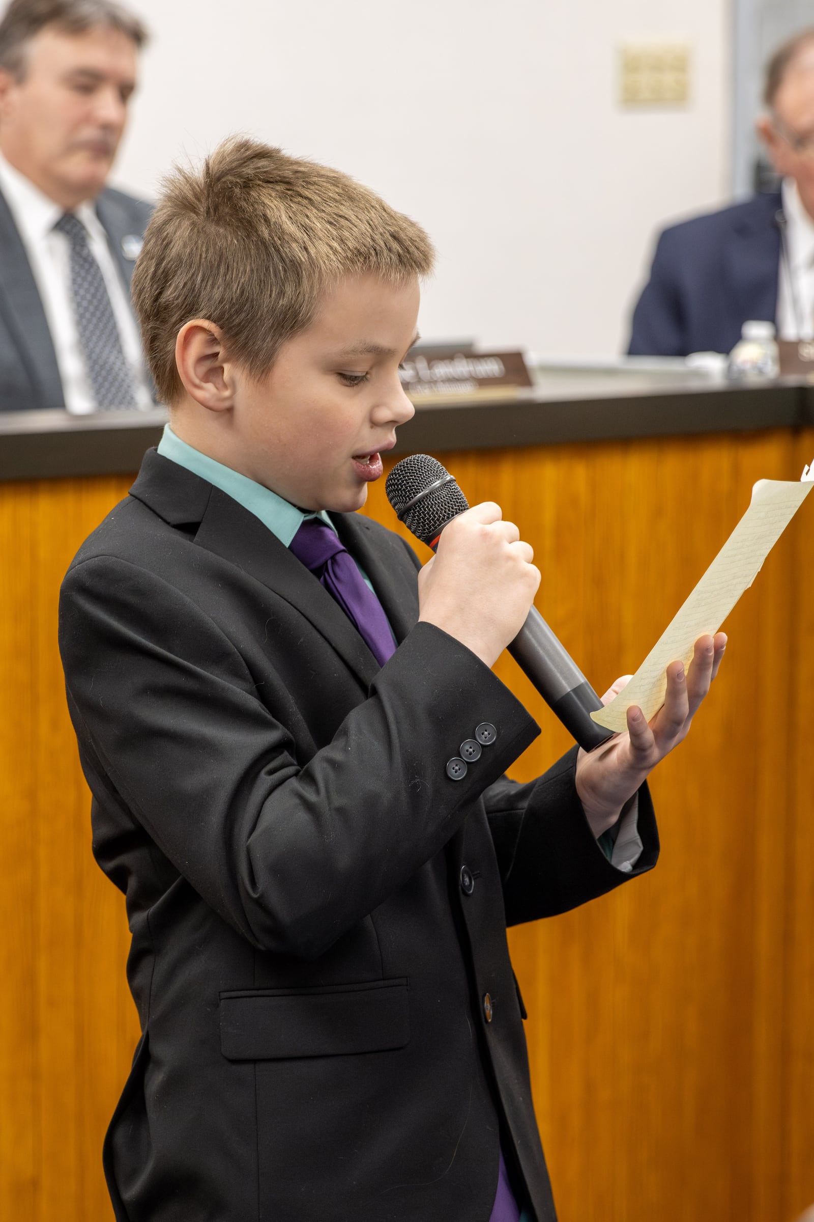 Anthony Diehl's son Robert reads his own remarks during the ceremony to accept Diehl's Carnegie Medal for Heroism, January 8, 2024. CONTRIBUTED