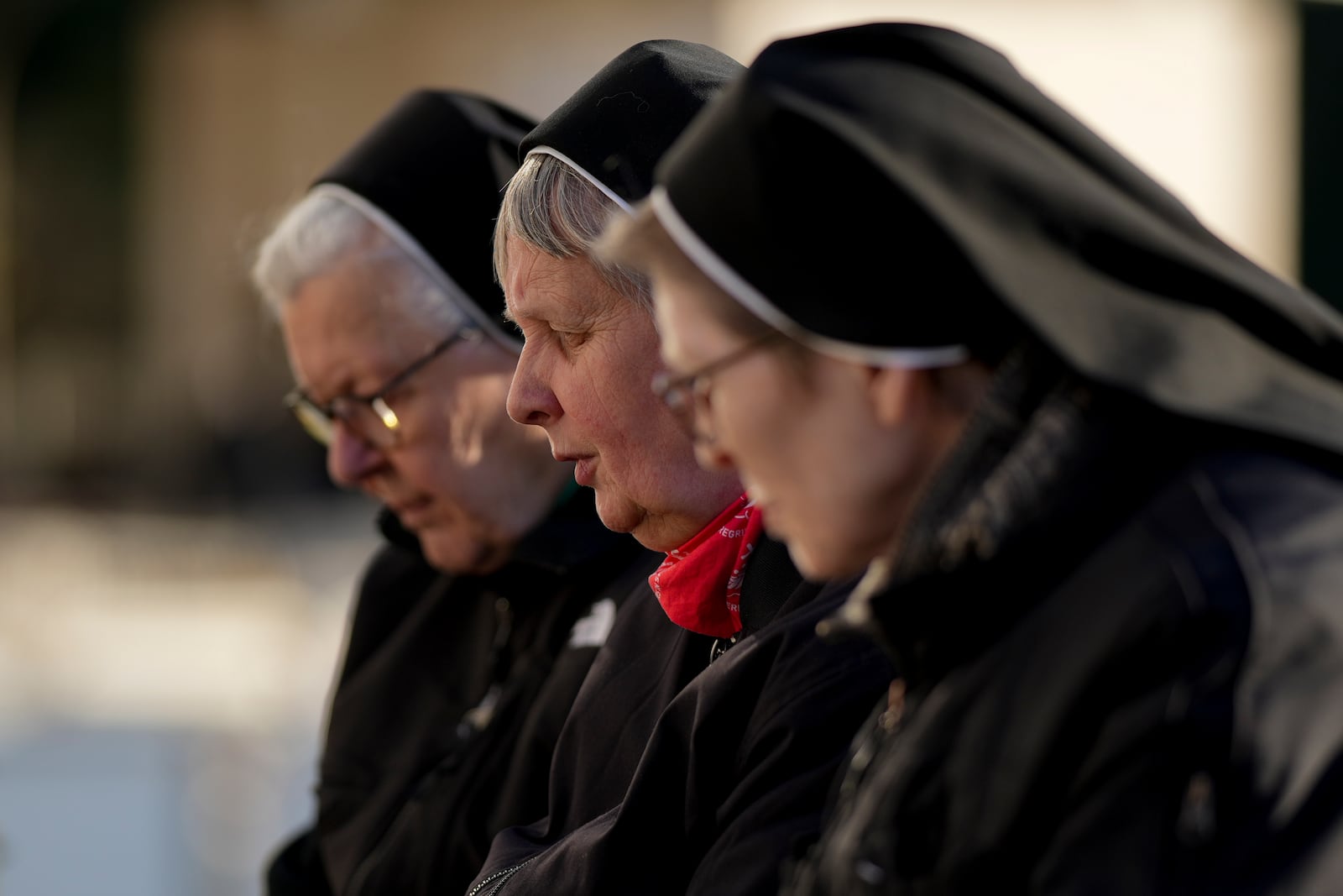 Nuns pray for Pope Francis in front of the Agostino Gemelli Polyclinic, in Rome, Wednesday, March 19, 2025, where the Pontiff is hospitalized since Friday, Feb. 14. (AP Photo/Andrew Medichini)