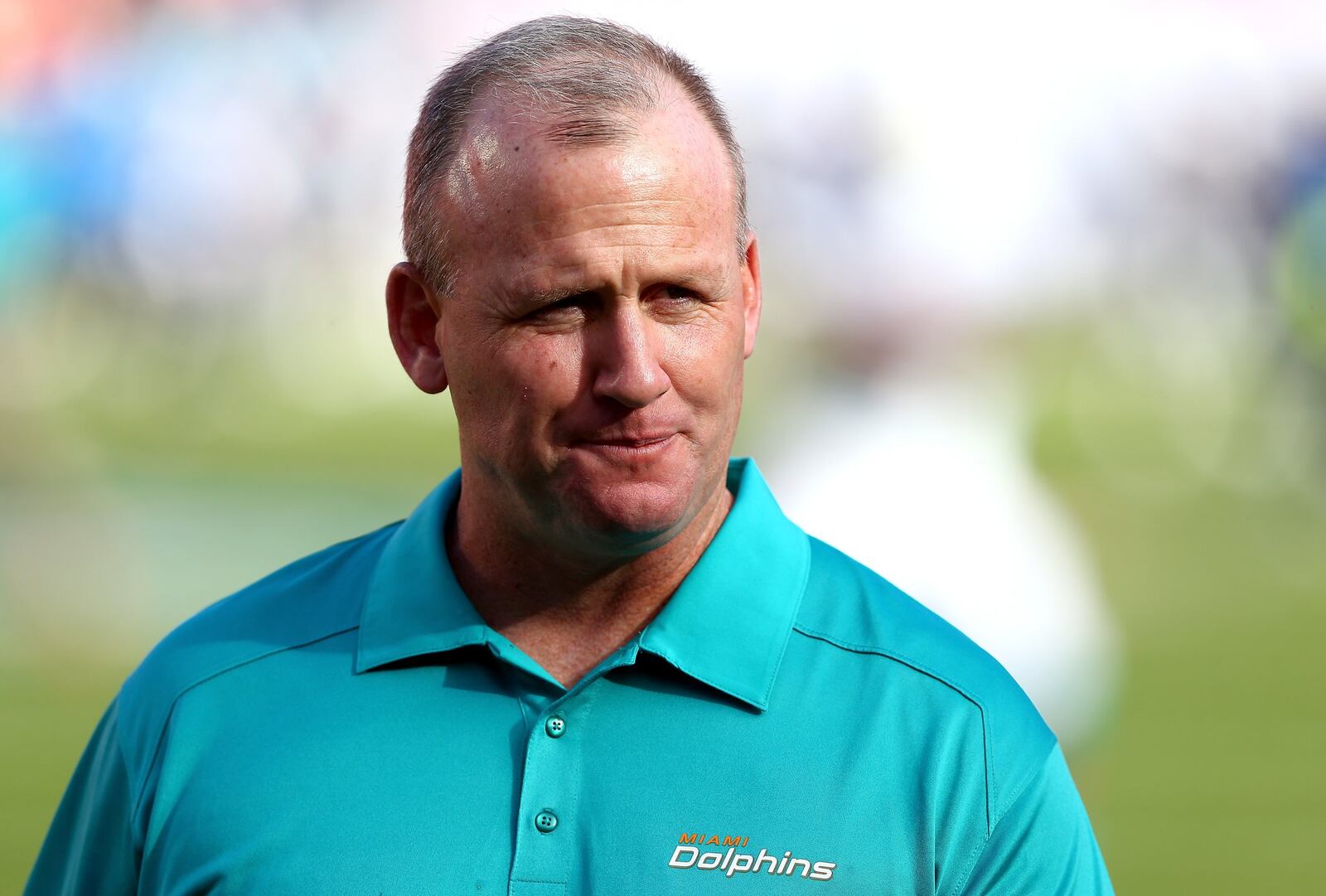 MIAMI GARDENS, FL - NOVEMBER 17: Offensive line coach, Jim Turner, of the Miami Dolphins coaches his players before their game against the San Diego Chargers at Sun Life Stadium on November 17, 2013 in Miami Gardens, Florida. (Photo by Streeter Lecka/Getty Images)