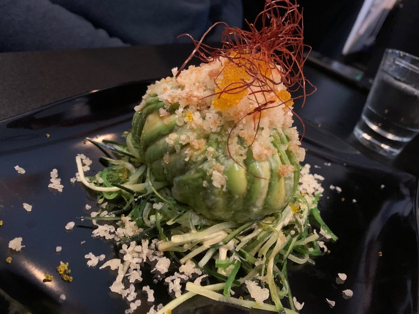 The Dragon egg features a core of spicy tuna with sushi rice and fried onions wrapped in a beautiful fanned-out avocado, making it look like an egg the size of a softball. CONTRIBUTED/ALEXIS LARSEN