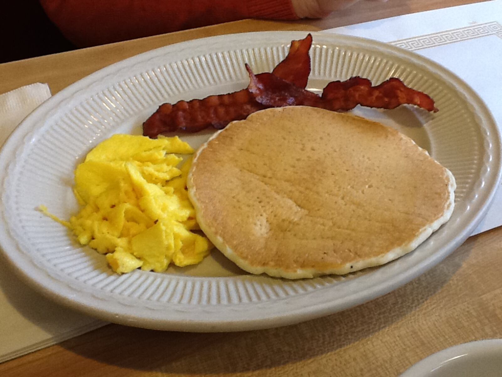 The Senior Pancake feast at George's comes with one pancake, one farm-fresh egg and two strips of bacon or one piece of sausage.