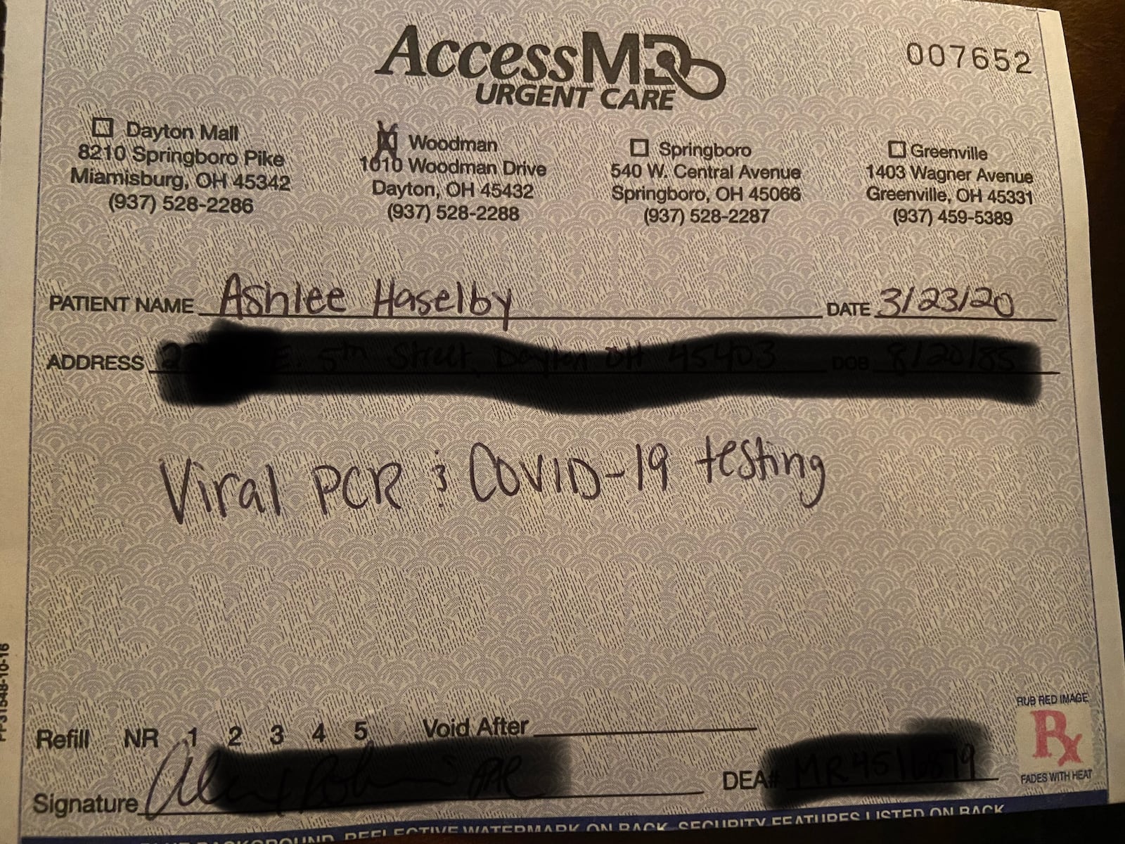 Dayton resident Ashlee Haselby received a doctors order to a coronavirus test, but says she was told she did not qualify to have the test. This news organization redacted the doctor's order to conceal personal and medical information.