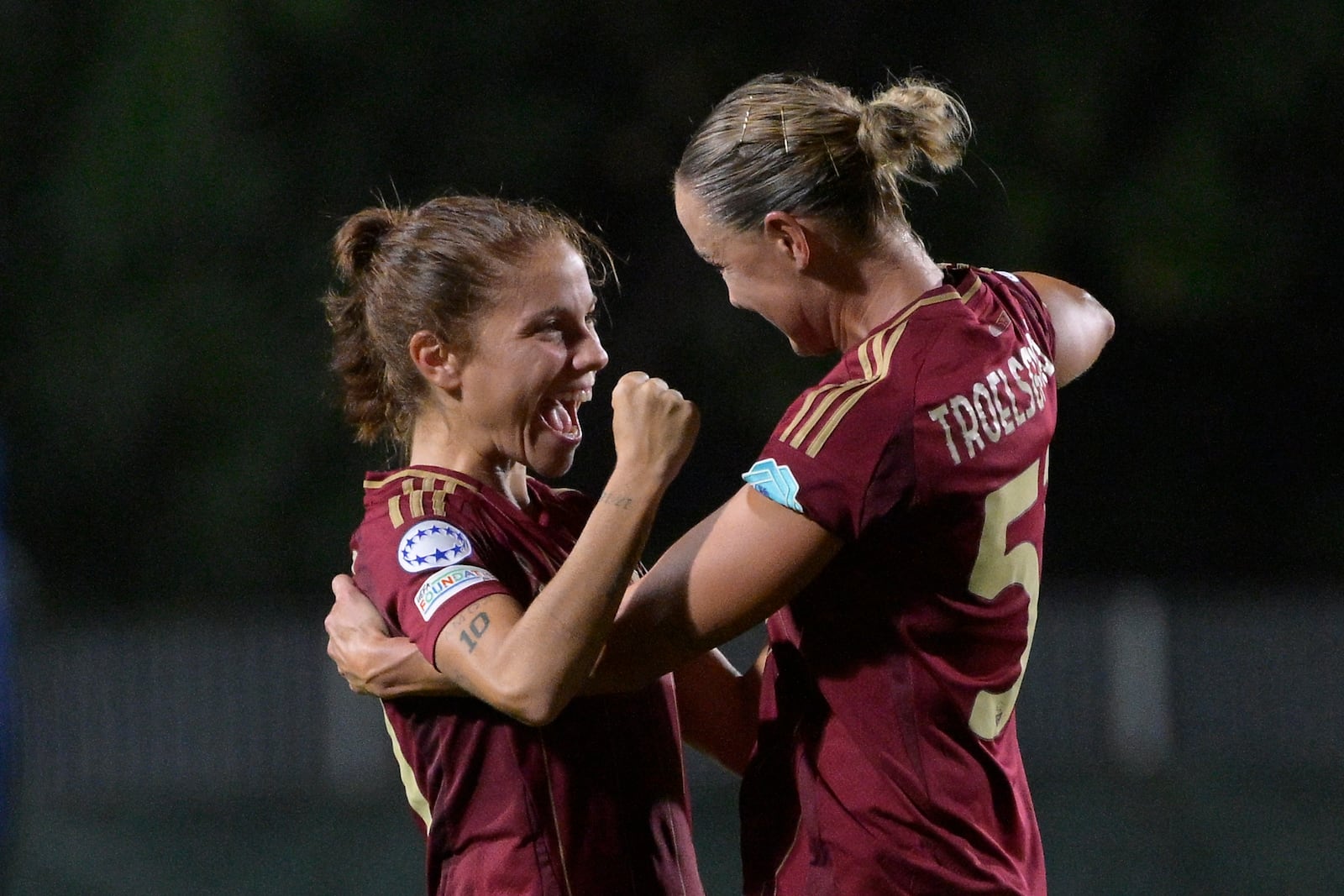 FILE - AS Roma's Manuela Giugliano, left, and Sanne Troelsgaard react during a women's Champions League Group A game between AS Roma and Wolfsburg at the Tre Fontane stadium in Rome, Tuesday, Oct. 8, 2024. (Fabrizio Corradetti/LaPresse via AP, File)