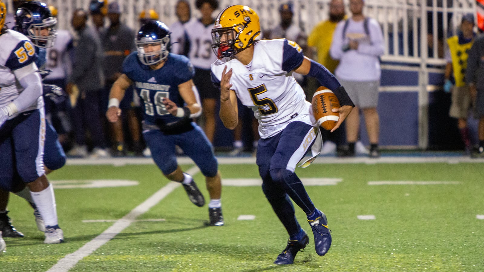 Springfield star cornerback Aaron Scott took over at quarterback and almost led the Wildcats to a come-from-behind victory at Fairmont. The Firebirds won 10-7. Jeff Gilbert/CONTRIBUTED