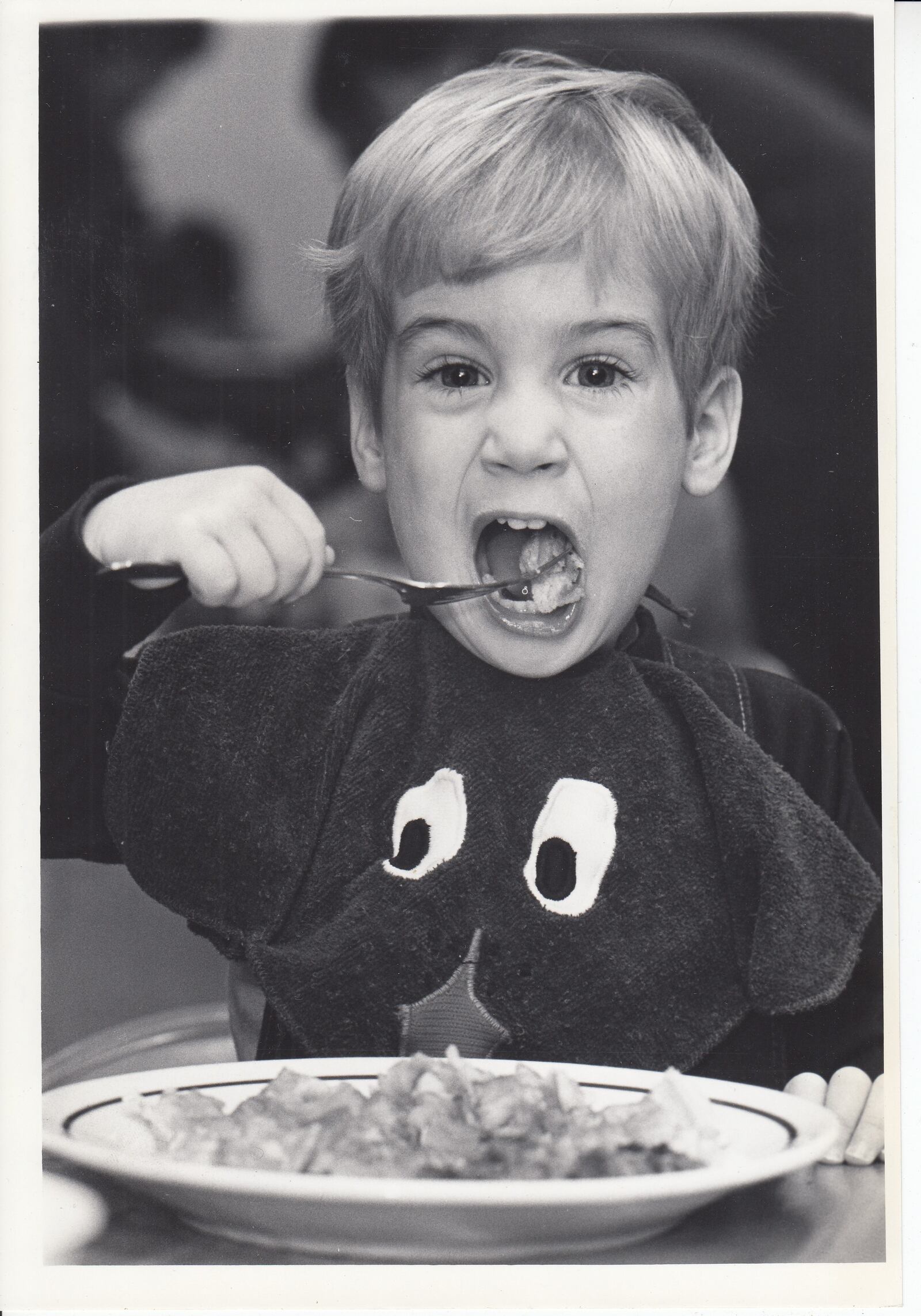 Christ Episcopal Church’s Women of the Parochial Society, one of eight women’s groups at the church at the time, launched Waffle Shop in 1929.   The holiday fundraiser has grown over the years.  Photo: Dec. 6, 1978  Peterson, Dayton Daily News  Tim Kingston, 3, munches on the hot waffles at Christ Episcopal Church.