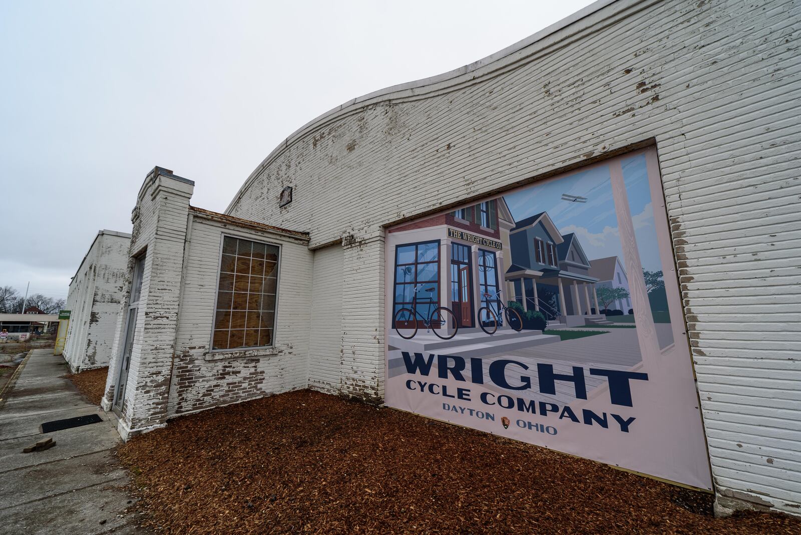 The Wright Company Factory site, located adjacent to the almost completed Dayton Metro Library West Branch off W. 3rd St. was the first factory to manufacture airplanes. Formed in 1909 by the Wright Brothers, construction of Building 1 was completed in 1910 followed by Building 2 in 1911. The City of Dayton, National Aviation Heritage Alliance and the National Park Service are currently partnering to stabilize the buildings. Here’s a look at the complex in its vacant state on Jul. 13, 2021. New vinyl illustrations of the Dayton Aviation Heritage National Historical Park's six Dayton area sites which include the factory were installed on the exterior of the buildings on Dec. 2, 2021. Once the National Park Service acquires the land, they will begin the transformation of the property into a museum. For more info and history of the factory, check out visitnaha.com. TOM GILLIAM / CONTRIBUTING PHOTOGRAPHER