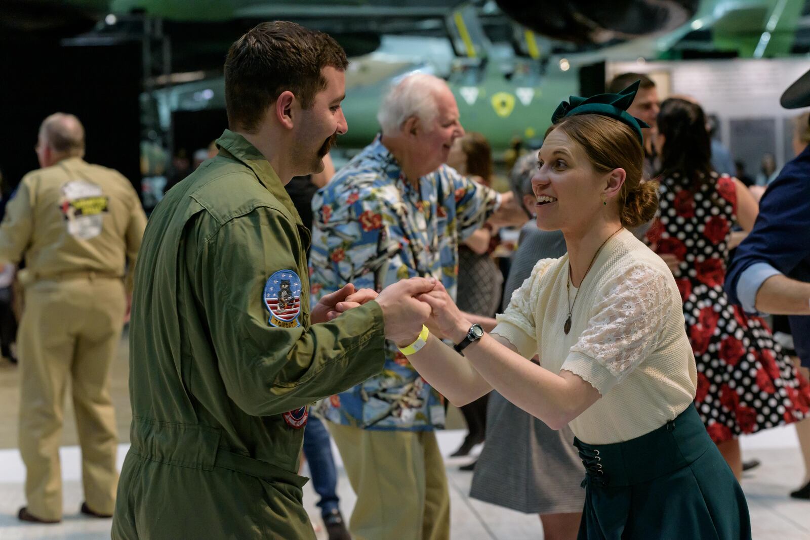 After Dark: Swing the Night Away was held at the National Museum of the U.S. Air Force on Saturday, Feb. 11, 2023. The museum’s quarterly after-hours 21 and up ticketed event featured food, games, trivia, cash bar, swing dancing with the Ohio Ballroom Dancers and rare artifacts including a wedding dress made from nine different parachutes. Attendees had up close and personal encounters with the WWII era Curtiss P-40E Warhawk, Martin B-26G Marauder, Curtiss P-36A Hawk and Korean War era F-84E Thunderjet planes. Did we spot you there? TOM GILLIAM / CONTRIBUTING PHOTOGRAPHER