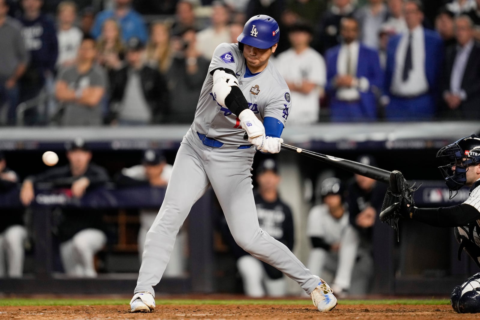 New York Yankees catcher Austin Wells interferes with the swing of Los Angeles Dodgers' Shohei Ohtani during the eighth inning in Game 5 of the baseball World Series, Wednesday, Oct. 30, 2024, in New York. (AP Photo/Ashley Landis)