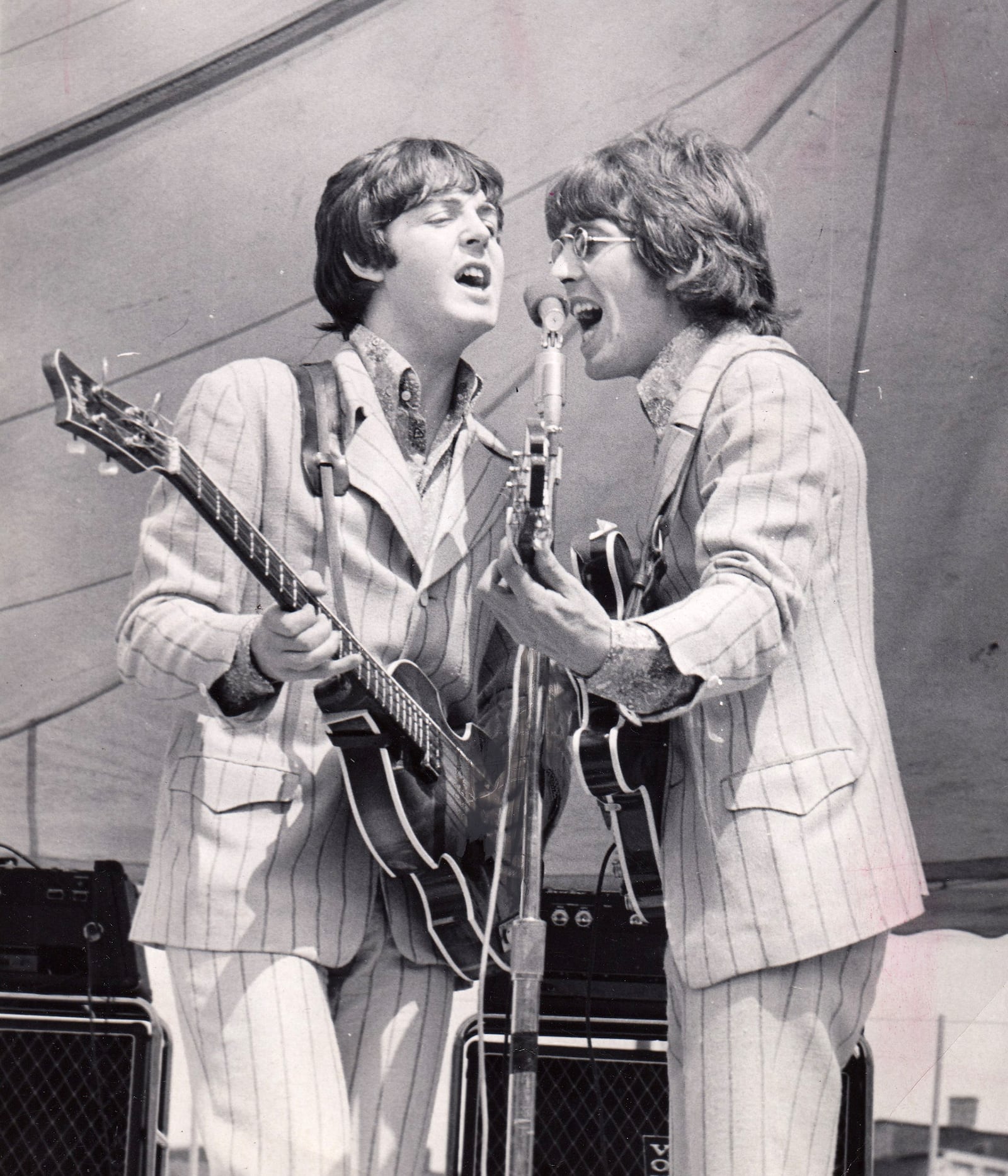 Paul McCartney and George Harrison perform during the Beatles 1966 concert at Crosley Field in Cincinnati. DAYTON DAILY NEWS ARCHIVE