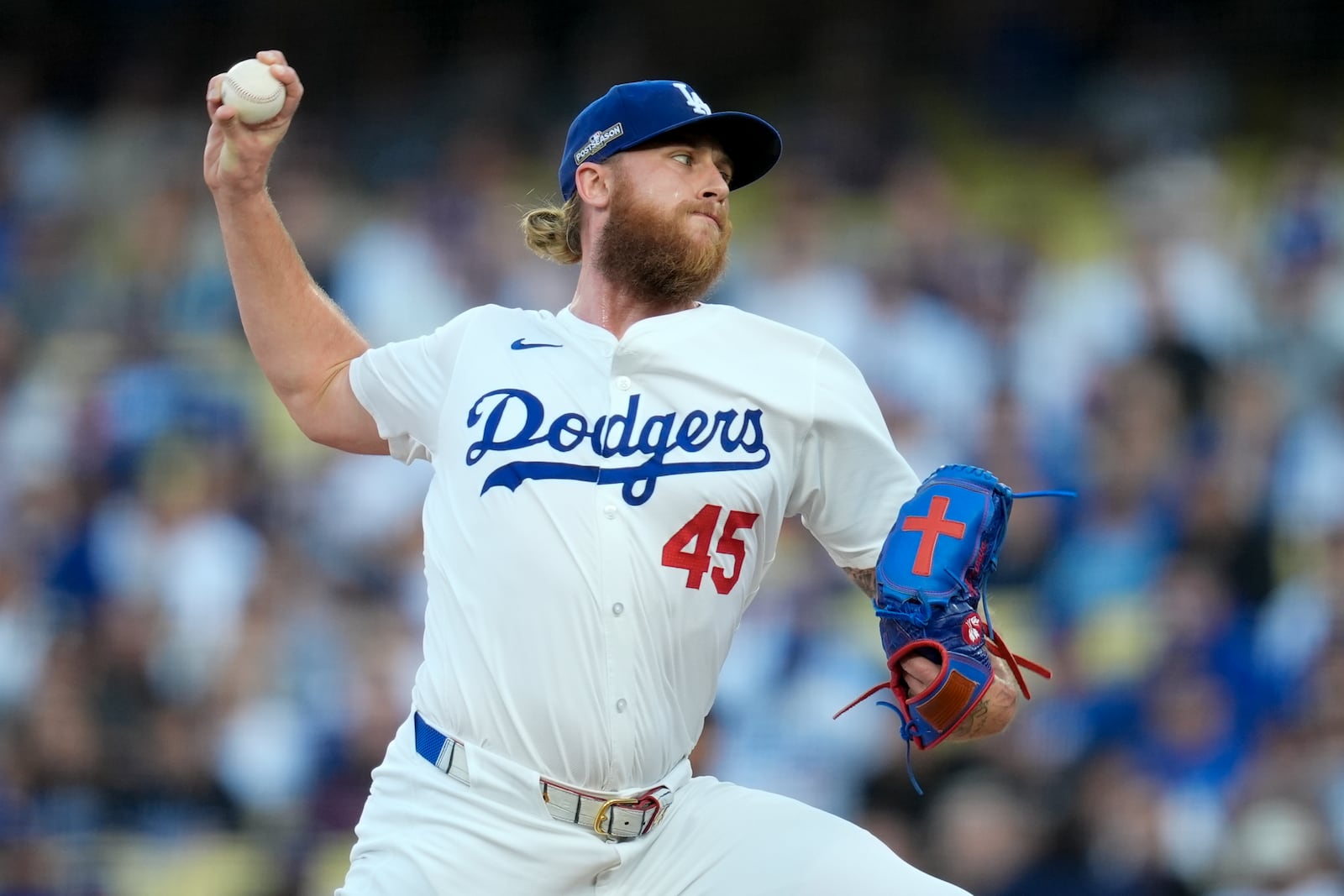 Los Angeles Dodgers pitcher Michael Kopech throws against the New York Mets during the first inning in Game 6 of a baseball NL Championship Series, Sunday, Oct. 20, 2024, in Los Angeles. (AP Photo/Ashley Landis)