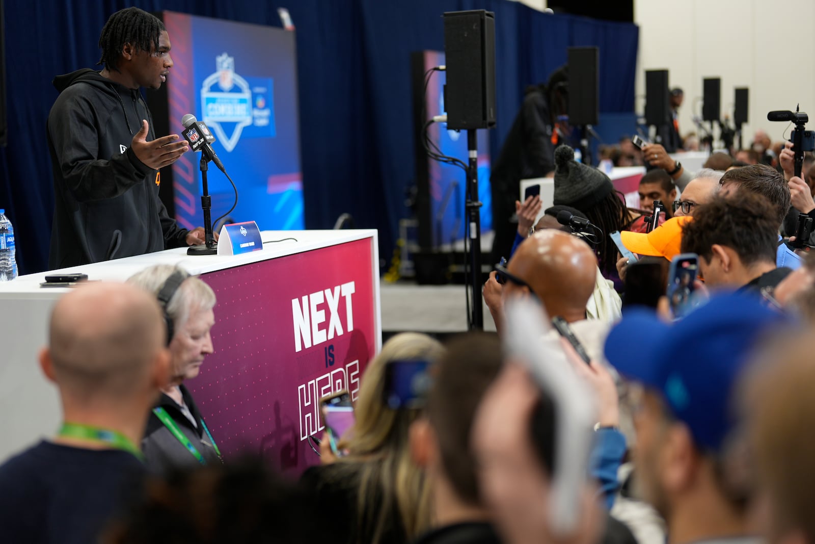 Miami quarterback Cam Ward speaks during a press conference at the NFL football scouting combine Friday, Feb. 28, 2025, in Indianapolis. (AP Photo/George Walker IV)