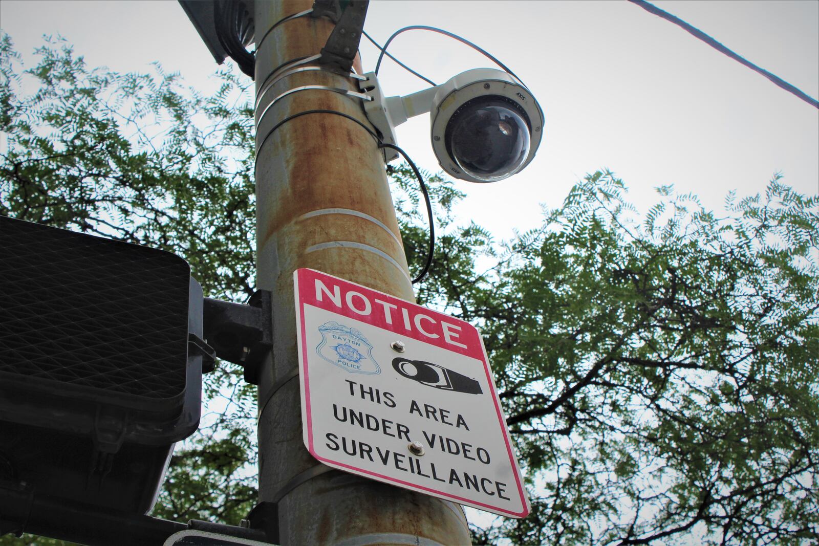 A security camera near Dayton City Hall at West Second and North Ludlow streets in downtown Dayton. City-owned cameras have been hooked up to the Fusus system as part of a pilot program. CORNELIUS FROLIK / STAFF