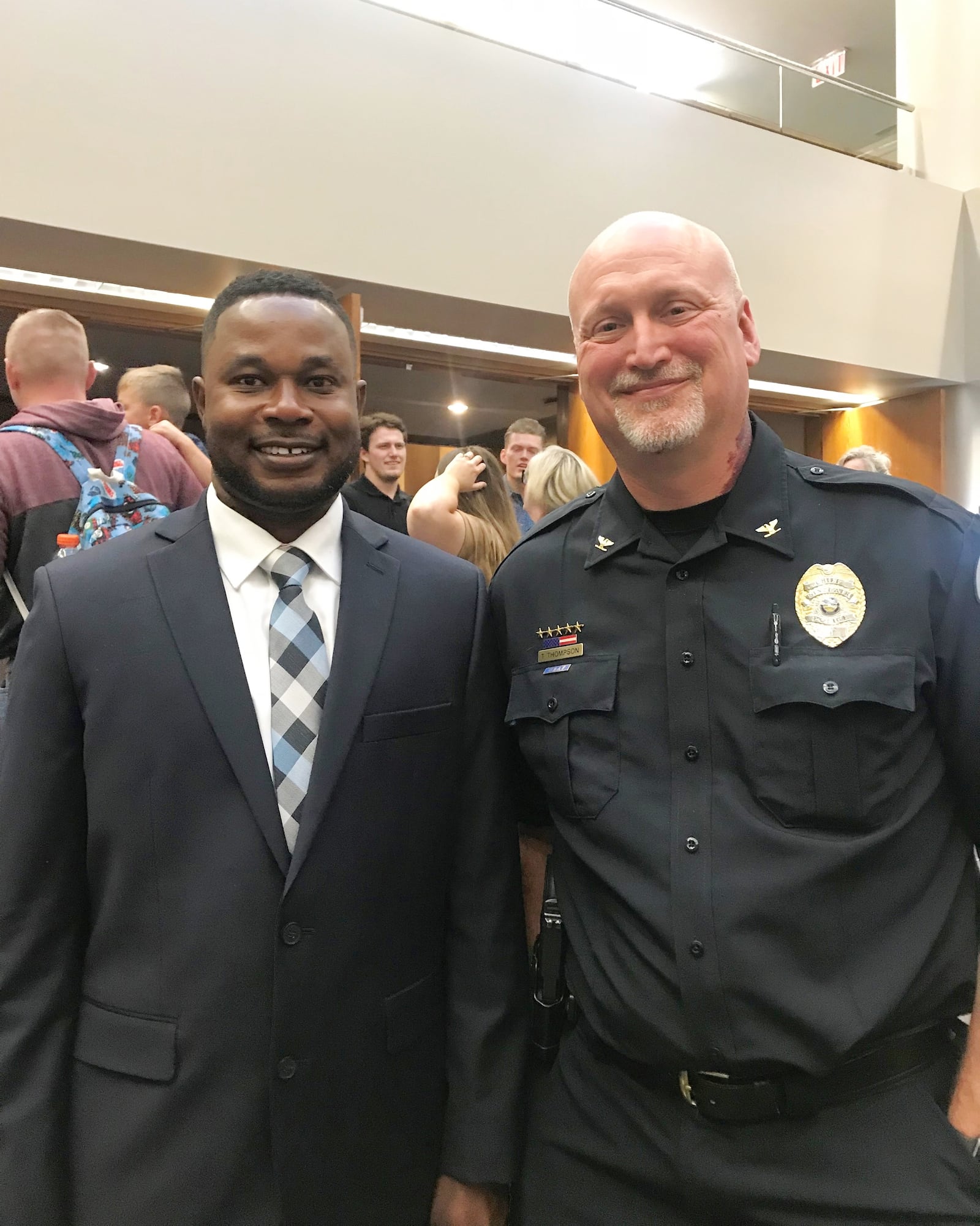 Sinclair Police Chief Tom Thompson (right) at the swearing in ceremony of Officer Kingsley who was originally from Ghana and graduated from the Sinclair Police Academy. CONTRIBUTED