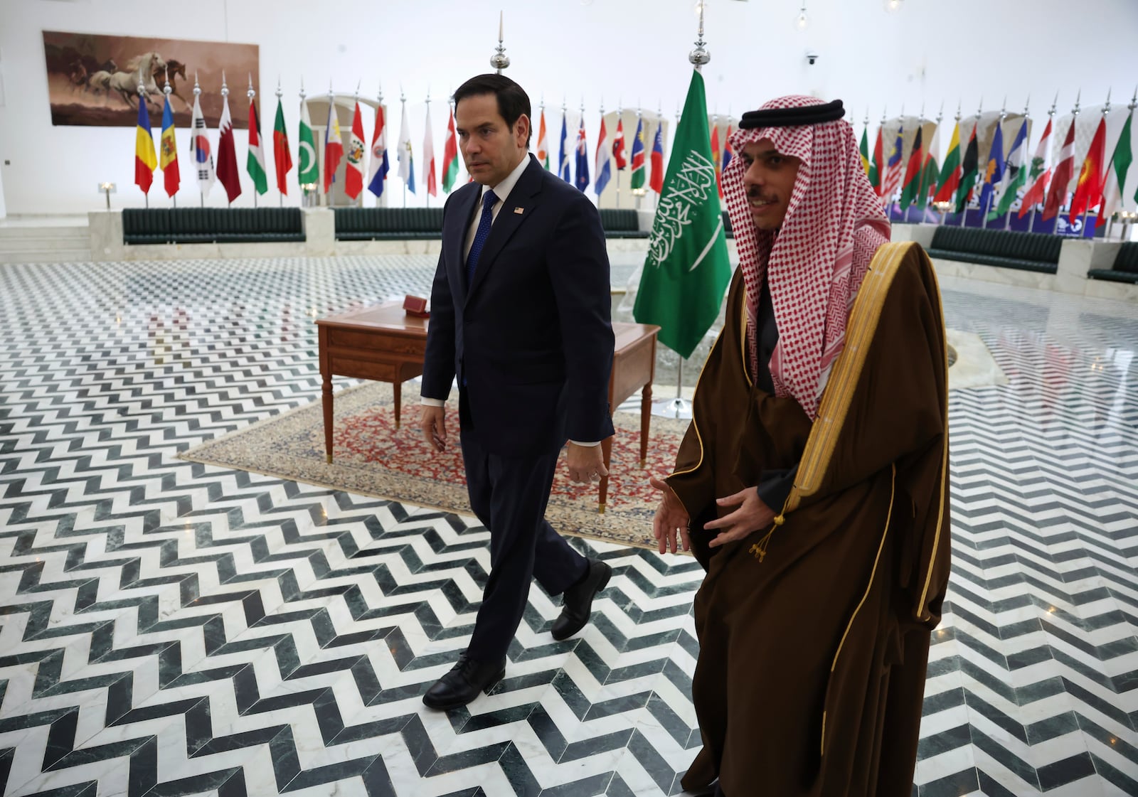 U.S. Secretary of State Marco Rubio, left, meets with Saudi Foreign Minister Prince Faisal bin Farhan Al Saud in Riyadh, Saudi Arabia, Monday Feb. 17, 2025. (Evelyn Hockstein/Pool Photo via AP)