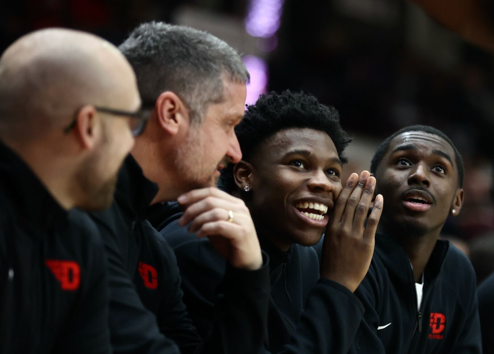 Dayton's Malachi Smith and Kobe Elvis watch a game from the bench against Fordham on Tuesday, Jan. 10, 2023, at Rose Hill Gym in Bronx, N.Y. David Jablonski/Staff