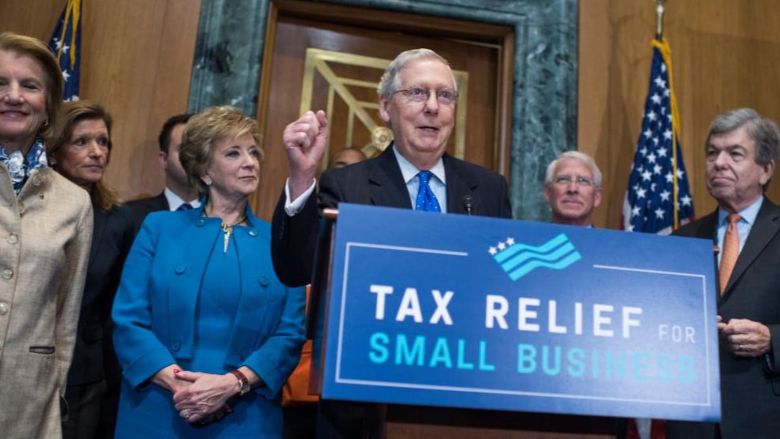 UNITED STATES - NOVEMBER 30: Senate Majority Leader Mitch McConnell, R-Ky., speaks during a news conference in Dirksen Building on the importance of passing the tax reform bill for small businesses on November 30, 2017. Also appearing in the front row are, from left, Sen. Shelley Moore Capito, R-W.Va., Linda McMahon, administrator of the U.S. Small Business Administration, Sens. Roger Wicker, R-Miss., and Roy Blunt, R-Mo. (Photo By Tom Williams/CQ Roll Call)