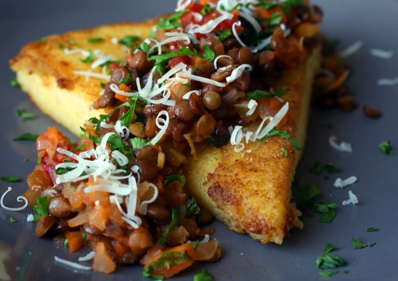 Polenta with Lentils in Tomato Sauce, a dish to celebrate the new year. (Christian Gooden/St. Louis Post-Dispatch/TNS)