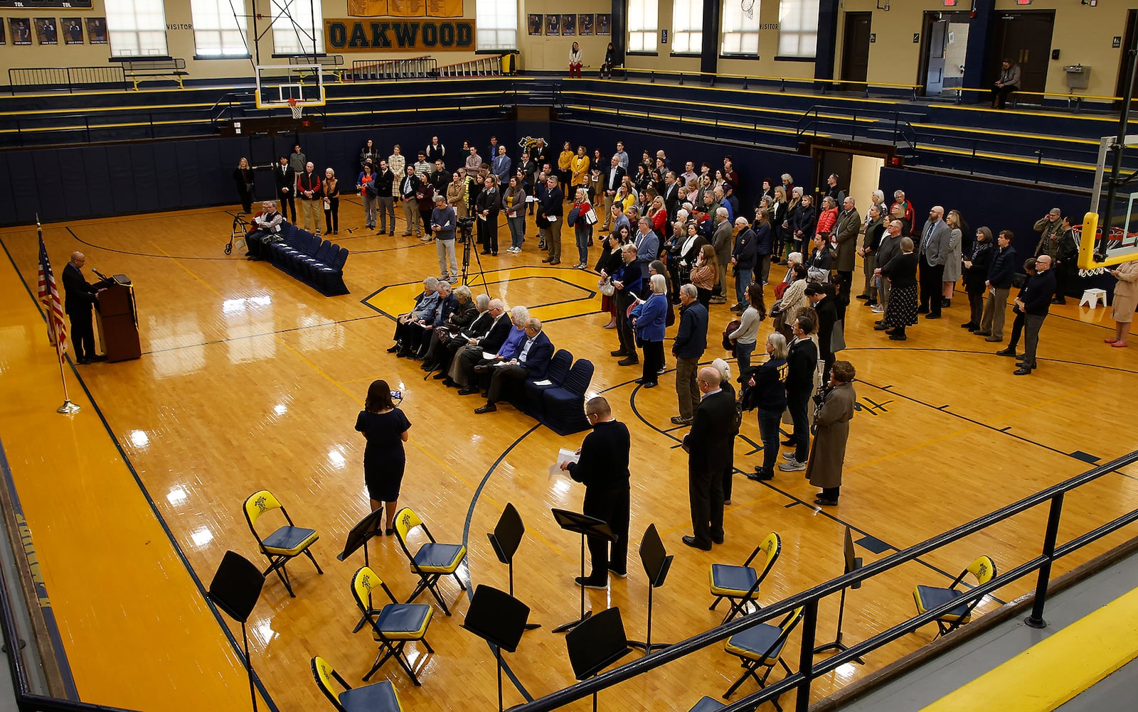 Neil Gupta, superintendent of Oakwood schools, speaks to attendees awaiting the unveiling of the new Rick and Jane Schwartz Performing Arts Wing at Oakwood High School Wednesday. BILL LACKEY/STAFF