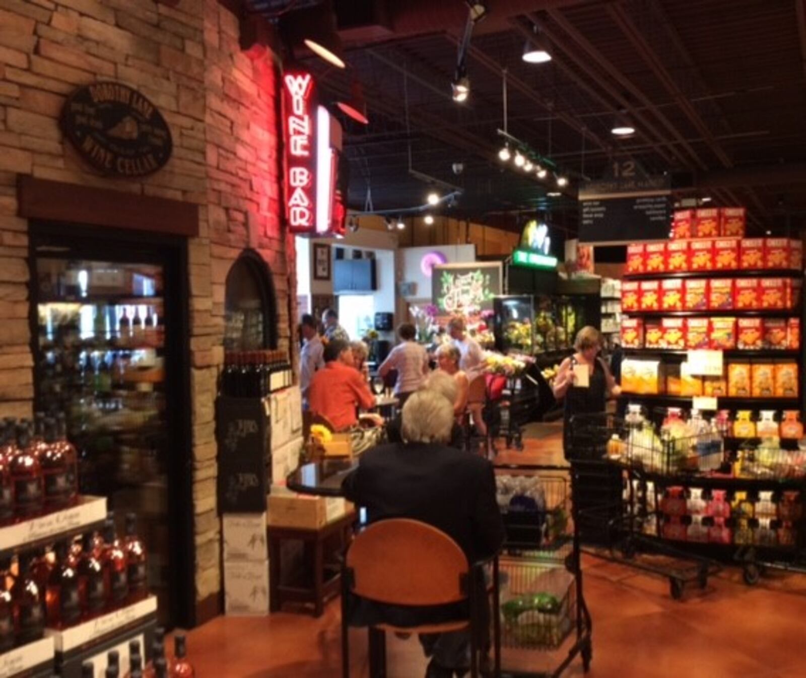 The wine-tasting bar (and beer growler-refill station) at Dorothy Lane Market’s Washington Square store. MARK FISHER/STAFF