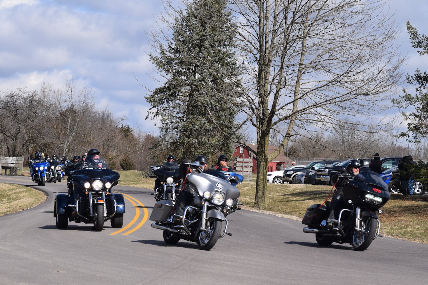 PHOTOS: Thousands of Outlaws attend motorcycle gang leaders funeral at Montgomery County Fairgrounds.