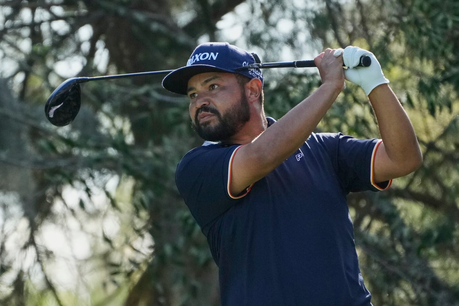 J.J. Spaun watches his tee shot on the fifth hole during the first round of The Players Championship golf tournament Thursday, March 13, 2025, in Ponte Vedra Beach, Fla. (AP Photo/Julia Demaree Nikhinson)