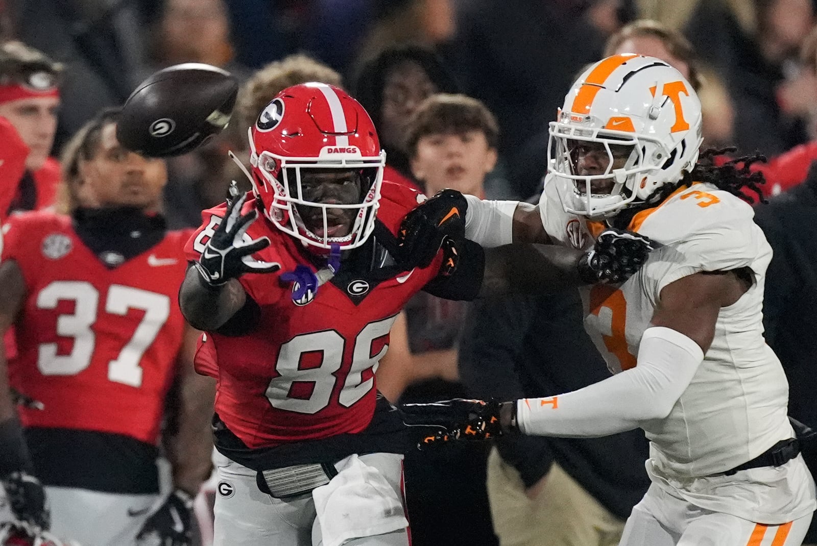 Georgia wide receiver Cole Speer (83) can not reach a pass as Tennessee defensive back Jermod McCoy (3) defends during the first half of an NCAA college football game, Saturday, Nov. 16, 2024, in Athens, Ga. (AP Photo/John Bazemore)