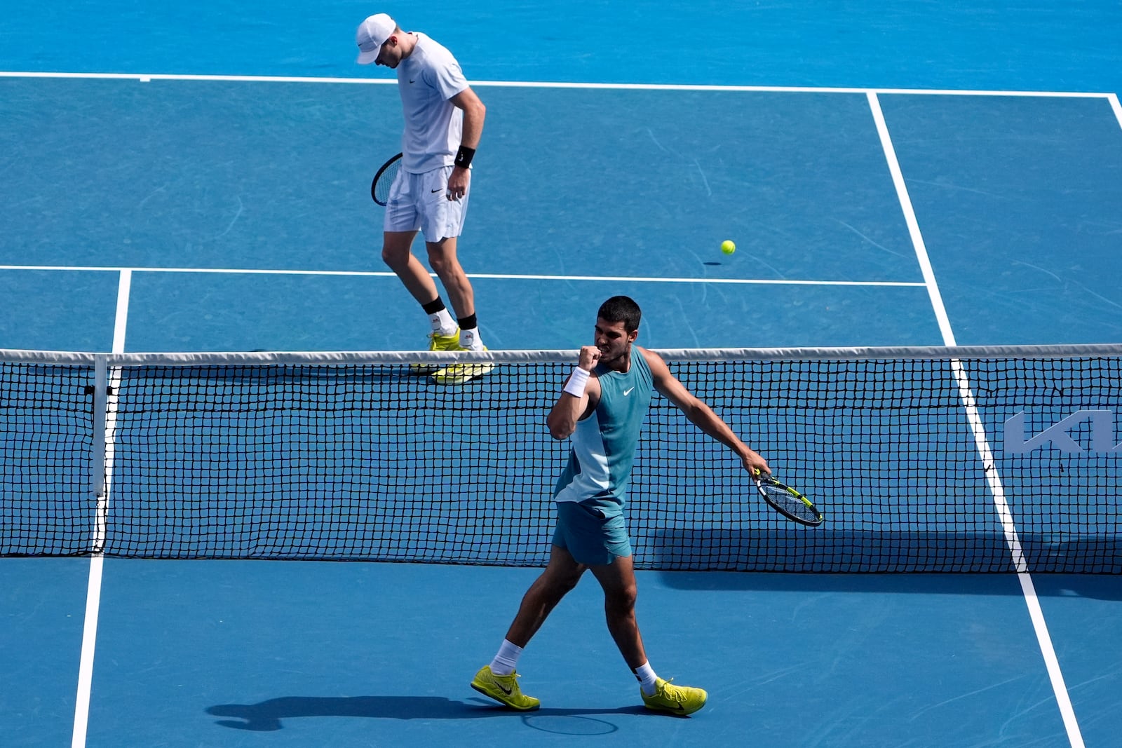 Carlos Alcaraz of Spain reacts during a fourth round match against Jack Draper of Britain, left, at the Australian Open tennis championship in Melbourne, Australia, Sunday, Jan. 19, 2025. (AP Photo/Asanka Brendon Ratnayake)