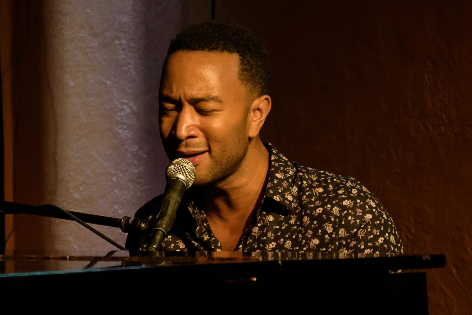 John Legend made a surprise visit to the Oregon District in Dayton on Sunday, Aug. 11, just one week after the mass shooting that killed nine and injured 27. Legend gave a private show at Blind Bob’s. TOM GILLIAM / CONTRIBUTING PHOTOGRAPHER