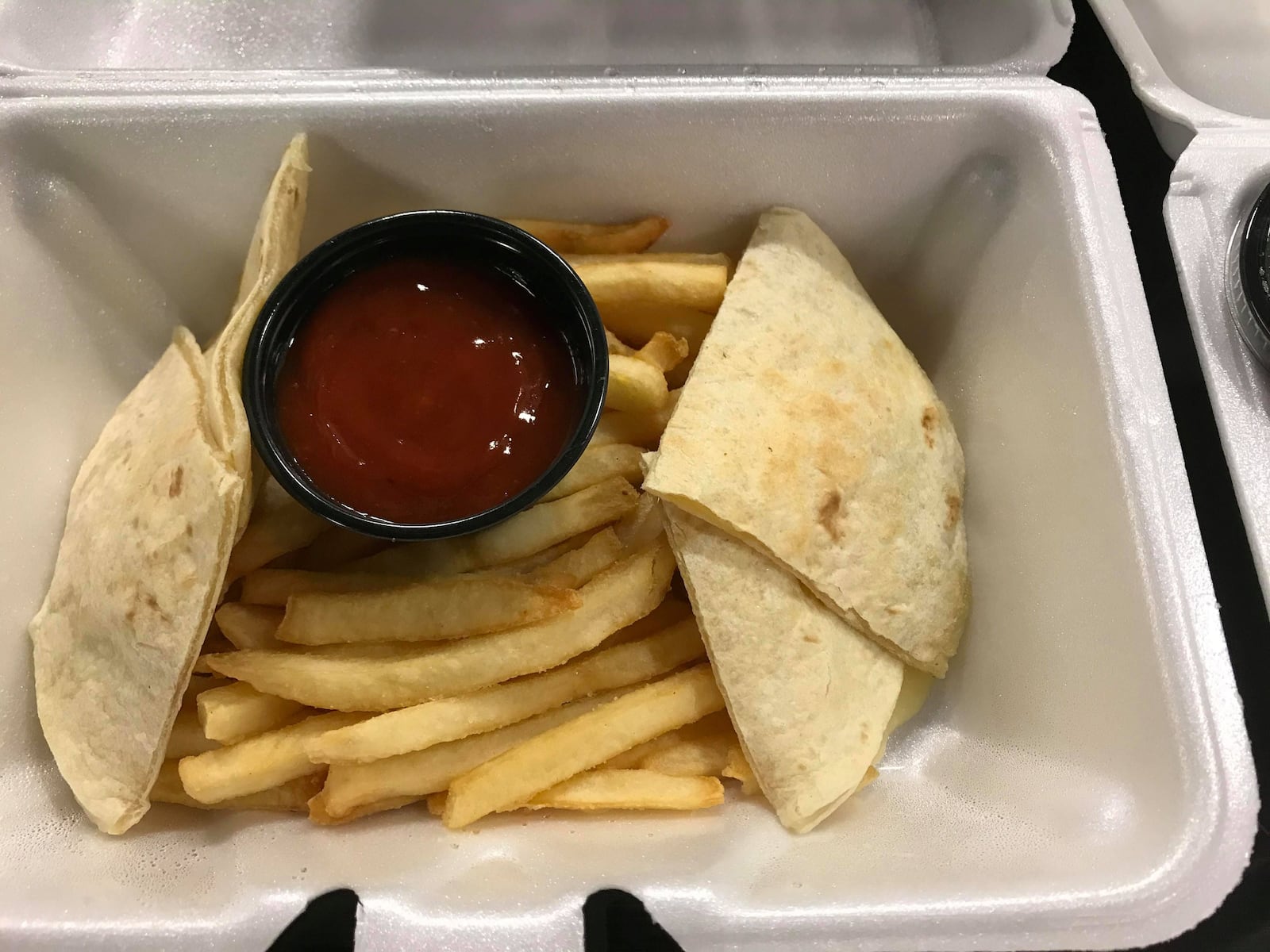 El Meson is among the restaurants offering carryout and curbside serve.  Cheese quesadilla and fries for the kids are available.