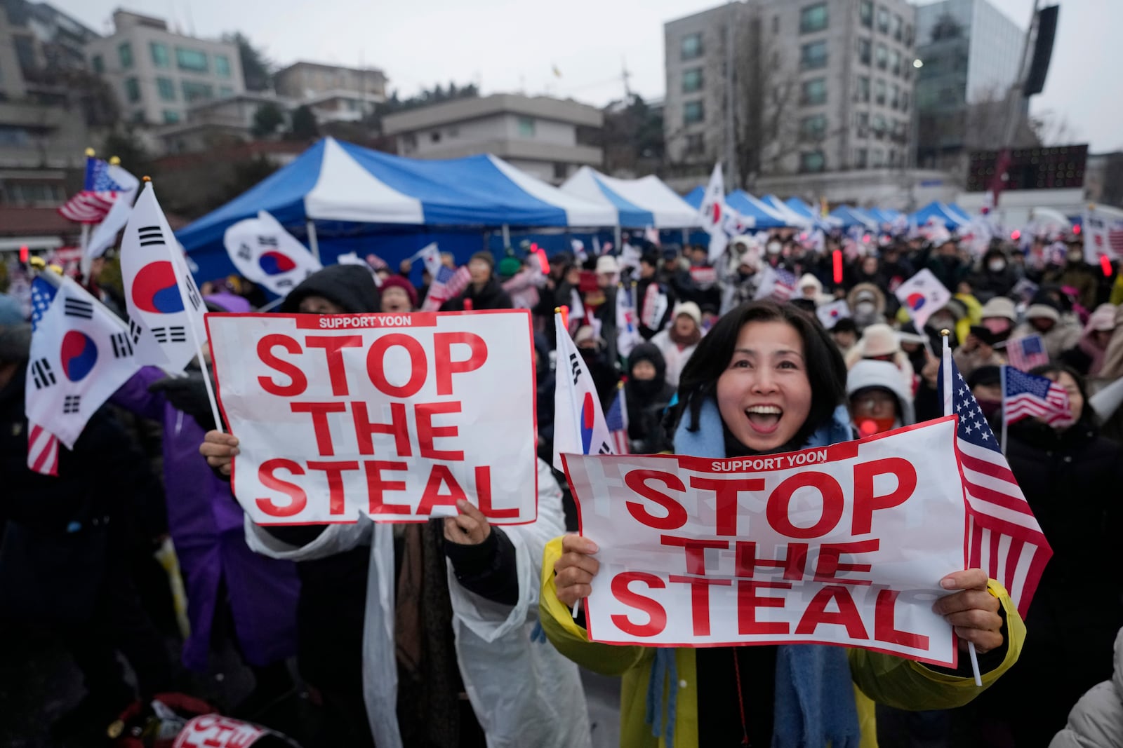 Supporters of impeached South Korean President Yoon Suk Yeol attend a rally to oppose his impeachment near the presidential residence in Seoul, South Korea, Monday, Jan. 6, 2025. (AP Photo/Ahn Young-joon)