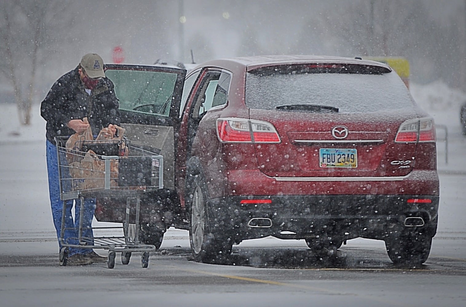 PHOTOS: Snow returns; brutally cold temperature ahead