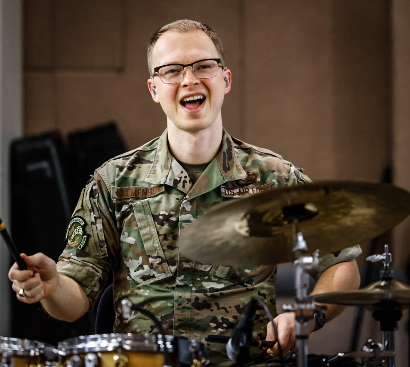 Air Force Band of Flight drummer, Andrew Clemenson keeps the beat during practice at the band's facility Wednesday December 6, 2023. JIM NOELKER/STAFF