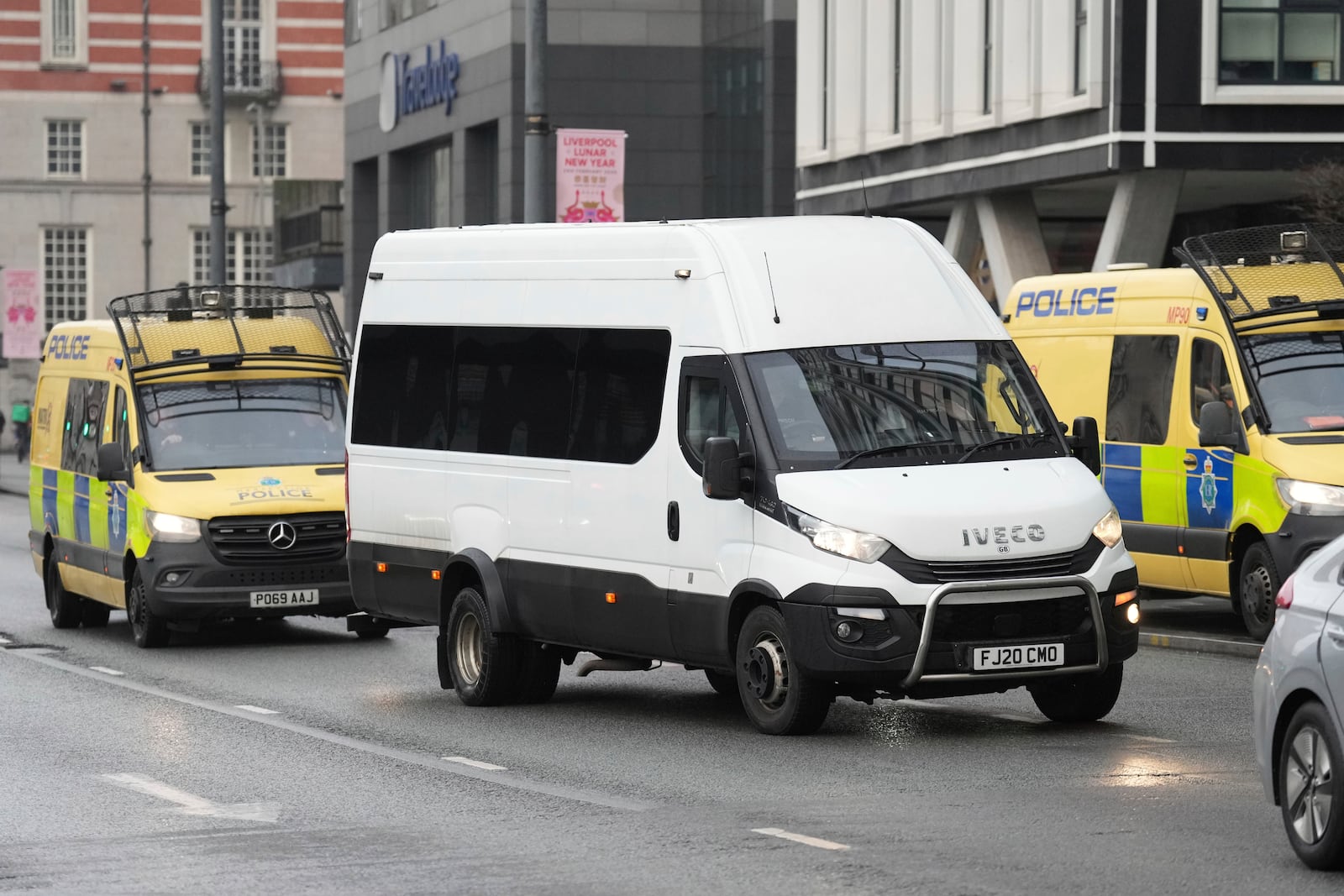 A prison van believed to contain Axel Rudakubana arrives at Liverpool Crown Court in Liverpool, England, Monday, Jan. 20, 2025 where Rudakubana is charged with killing three girls and wounding 10 other people in a stabbing rampage at a Taylor Swift-themed dance class in England last summer.(AP Photo/Jon Super)