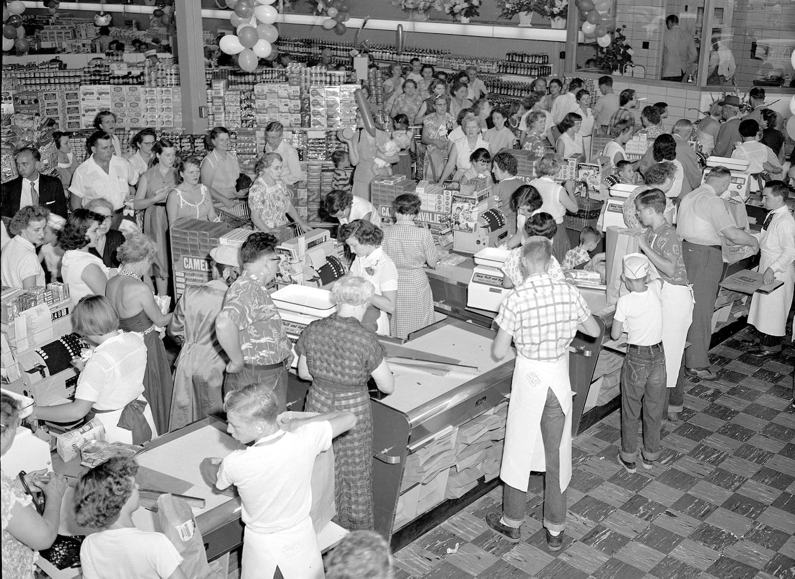 Photo credit: NCR Archive at the Montgomery County Historical Society--People flocked to the Grand Opening of Dorothy Lane Market in 1953. Circa August 5, 1953.