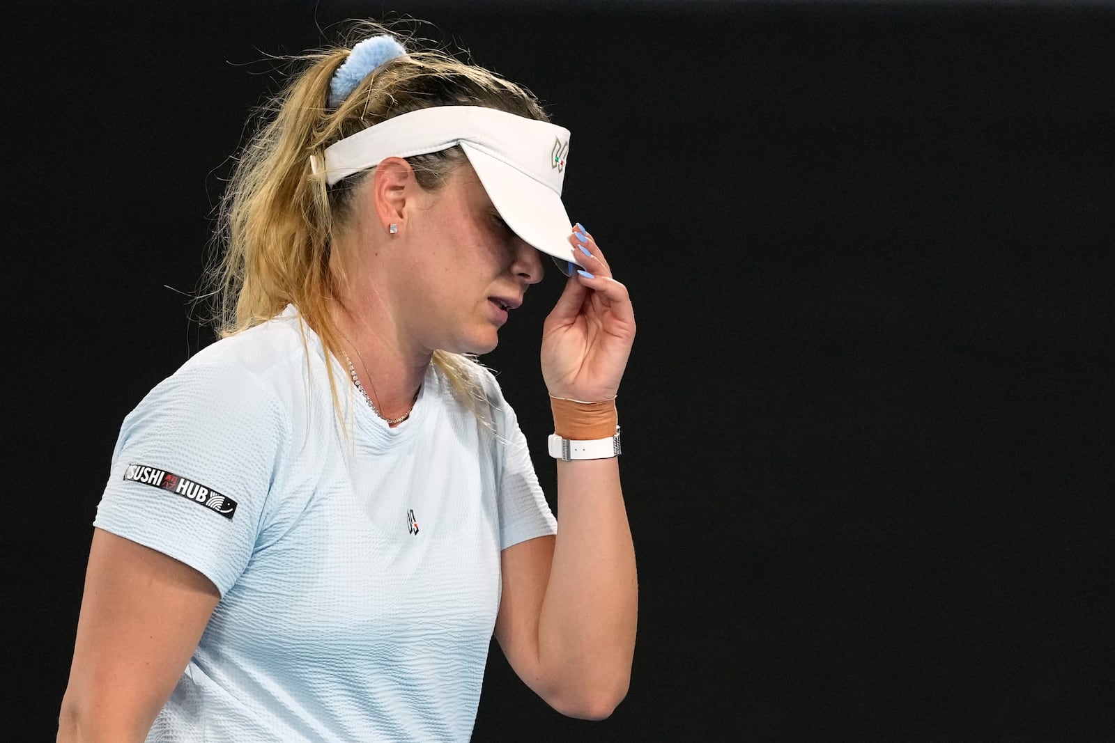 Donna Vekic of Croatia reacts during her first round match against Diane Parry of France at the Australian Open tennis championship in Melbourne, Australia, Sunday, Jan. 12, 2025. (AP Photo/Asanka Brendon Ratnayake)