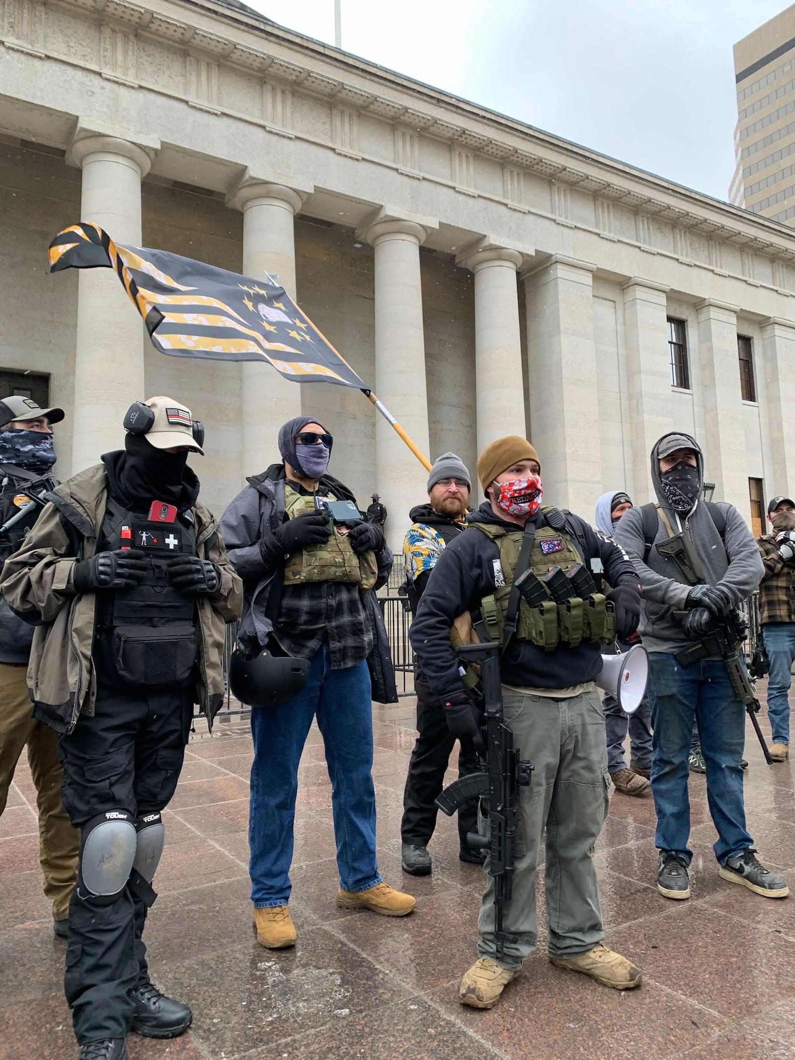 A group of protestors outside the Ohio Statehouse on Sunday.