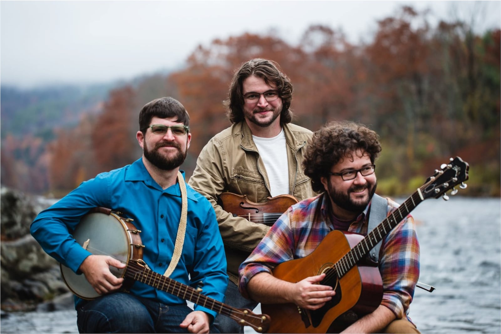 Unclassifiable acoustic trio the Faux Paws, (left to right) Chris Miller, Noah VanNorstrand and his brother Andrew, perform at The Foundry Theater at Antioch College in Yellow Springs on Saturday.