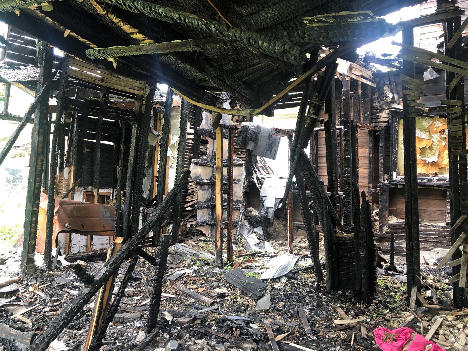 The inside of a fire-damaged home at 2030 E. Fourth St. CORNELIUS FROLIK / STAFF