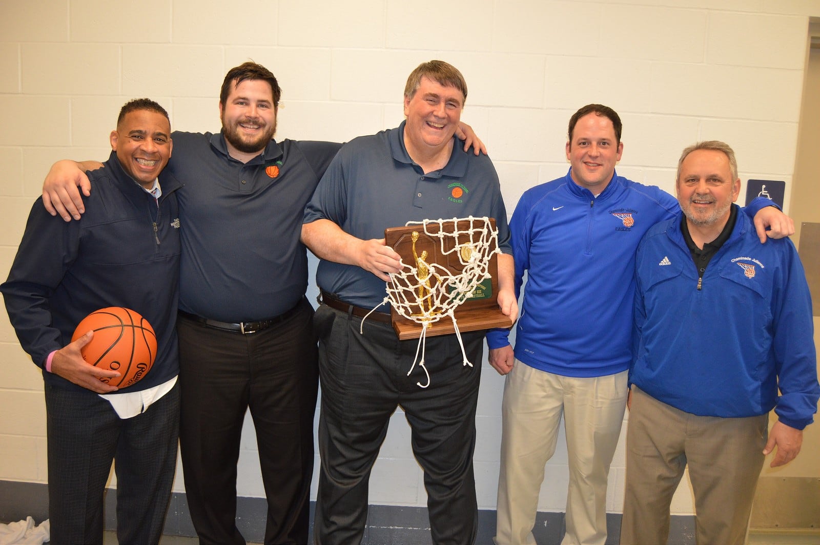 The Chaminade Julianne coaching staff after winning a regional championship in 2015, from left: Rich Kidd, Joe Staley Jr., Head Coach Joe Staley Sr., Charlie Szabo (then an assistant but now the current head coach at CJ) and assistant Tony Ricciuto. CONTRIBUTED