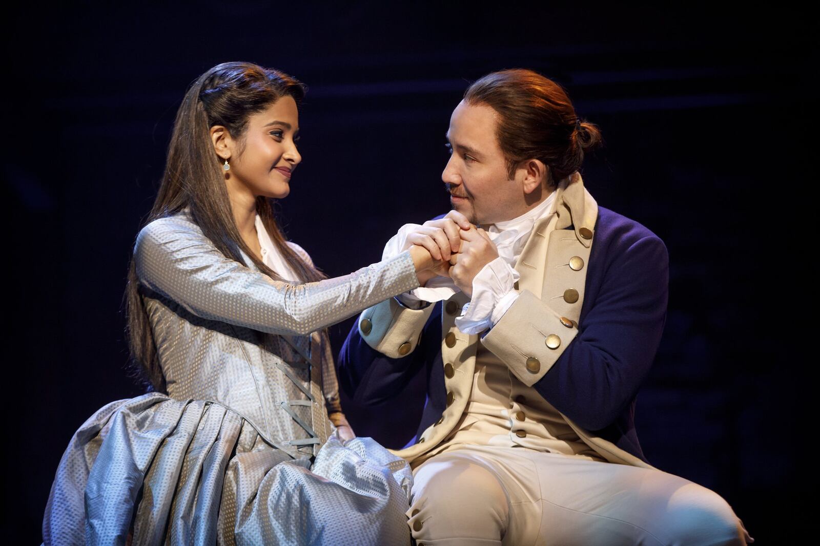 The Broadway tour of “Hamilton” will include a two-week run in Dayton at the Schuster Center during the 2021-22 season. Pictured are Shoba Narayan and Joseph Morales as Eliza and Alexander Hamilton. JOAN MARCUS/CONTRIBUTED