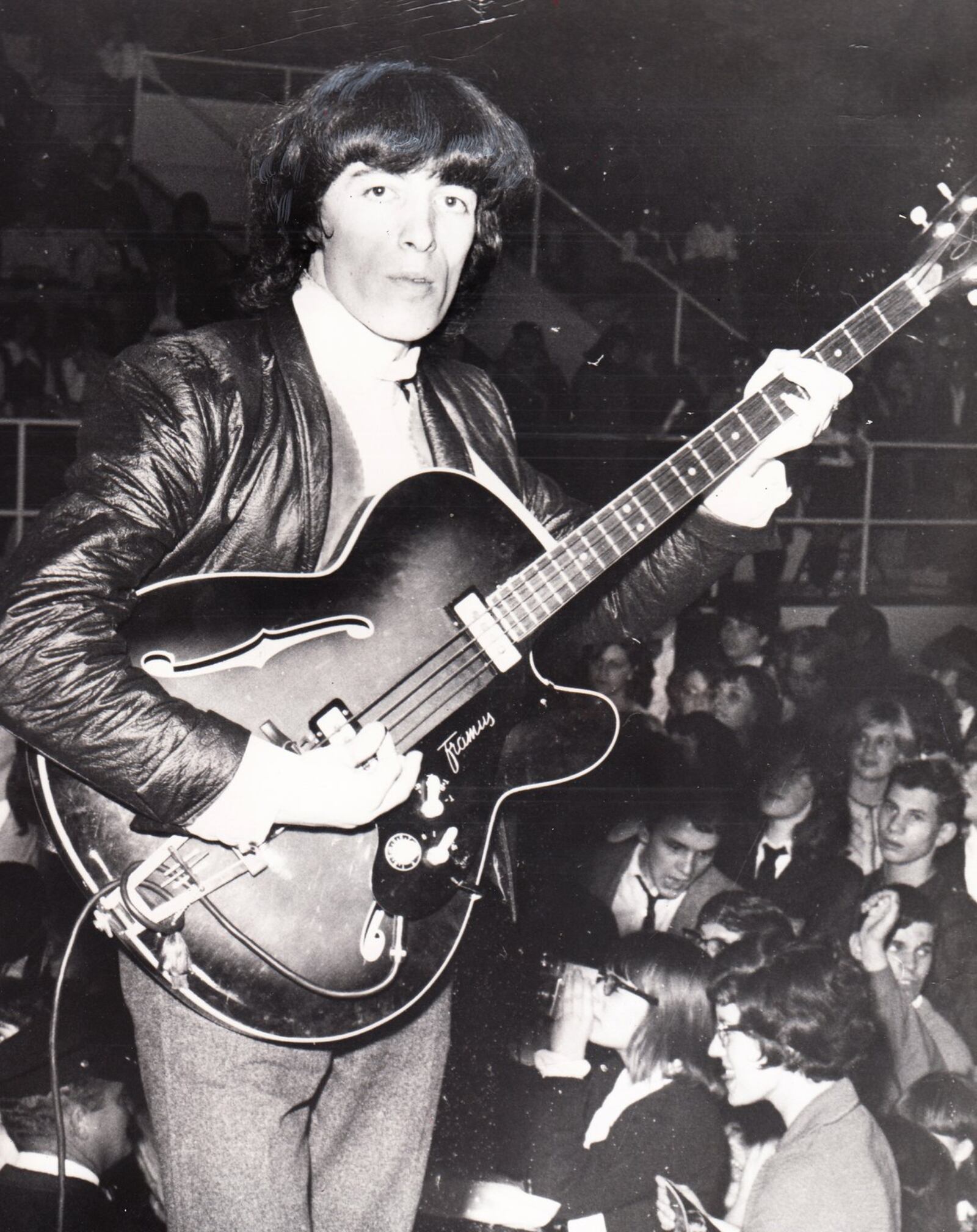 Bill Wyman of the Rolling Stones plays guitar at a 1964 concert held at Hara Arena. DAYTON DAILY NEWS ARCHIVE