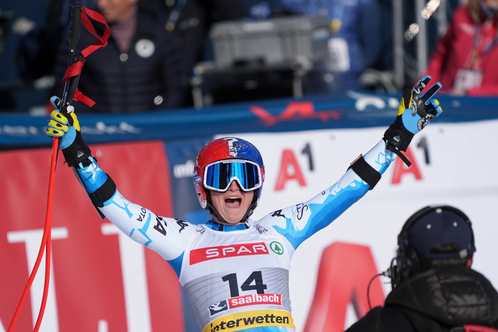 United States' Lauren Macuga celebrates at the finish area of a women's Super-G, at the Alpine Ski World Championships, in Saalbach-Hinterglemm, Austria, Thursday, Feb. 6, 2025. (AP Photo/Giovanni Auletta)