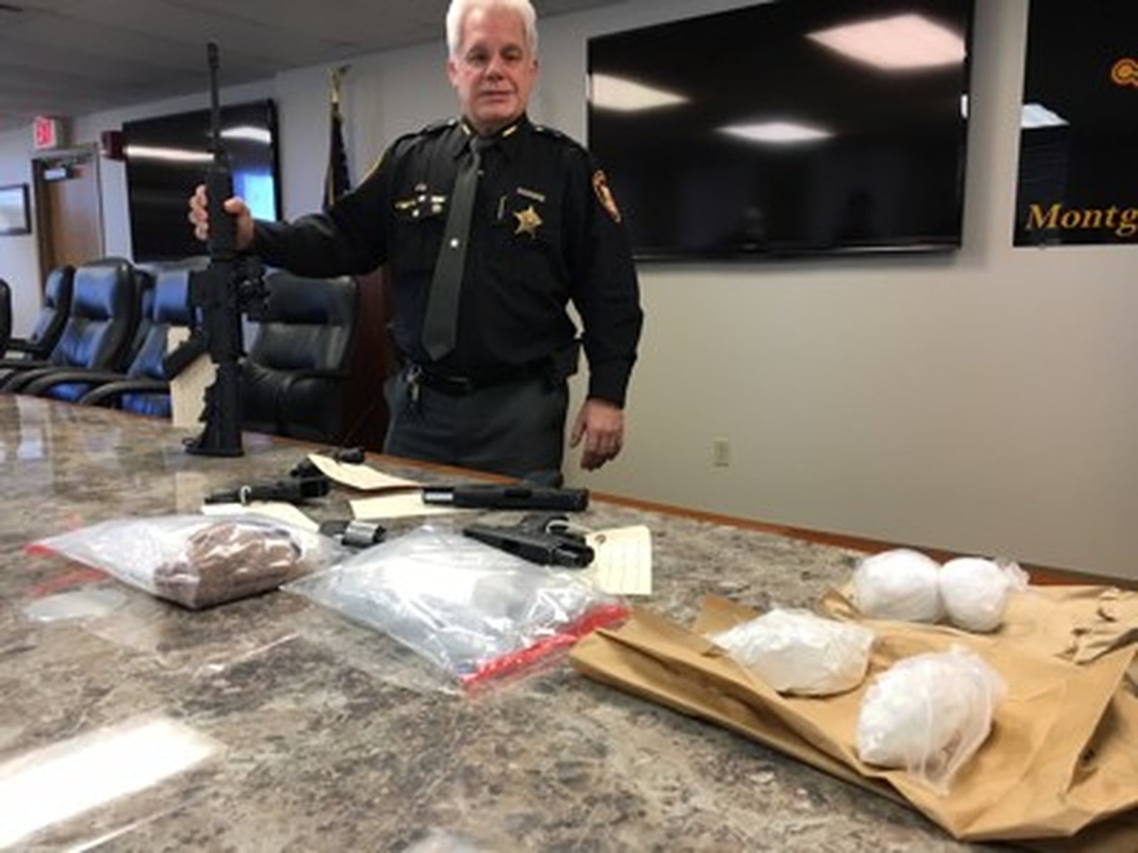 Montgomery County Sheriff Phil Plummer talks about a drug seizure. He is planning community talks and has cautioned law officers about the dangers of being near some synthetic drugs that have been linked to hundreds of area deaths already in 2017.