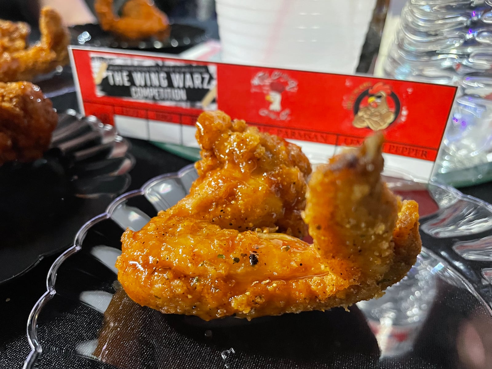 Steven Earnest, owner of Lord of the Wings, and Michael Baxter, owner of Mother Clucking Chicken Coop, both came out on top as they battled it out in a chicken wing competition on Saturday at The Arena Sports Bar in Dayton. NATALIE JONES/STAFF