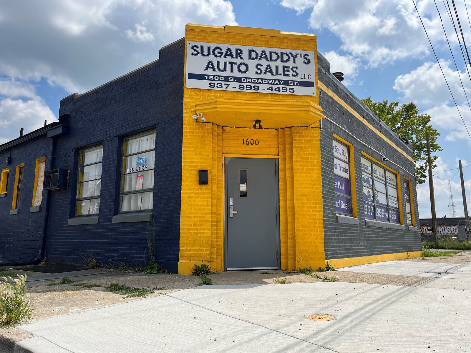 The owner of Sugar Daddy's Auto Sales at 1600 S. Broadway St. would like to turn the business into an adult theater that has exotic dancing and pole dancing. CORNELIUS FROLIK / STAFF