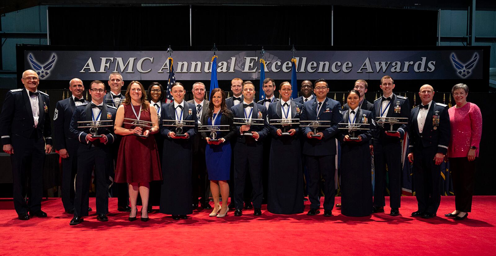 Air Force Materiel Command Annual Excellence Awards winners pose with AFMC leadership at the end of the ceremony March 23 in the National Museum of the U.S. Air Force. Airmen and civilian personnel from AFMC centers around the Air Force, as well as those assigned to Space Force, competed in 17 categories. U.S. AIR FORCE PHOTO/R.J. ORIEZ