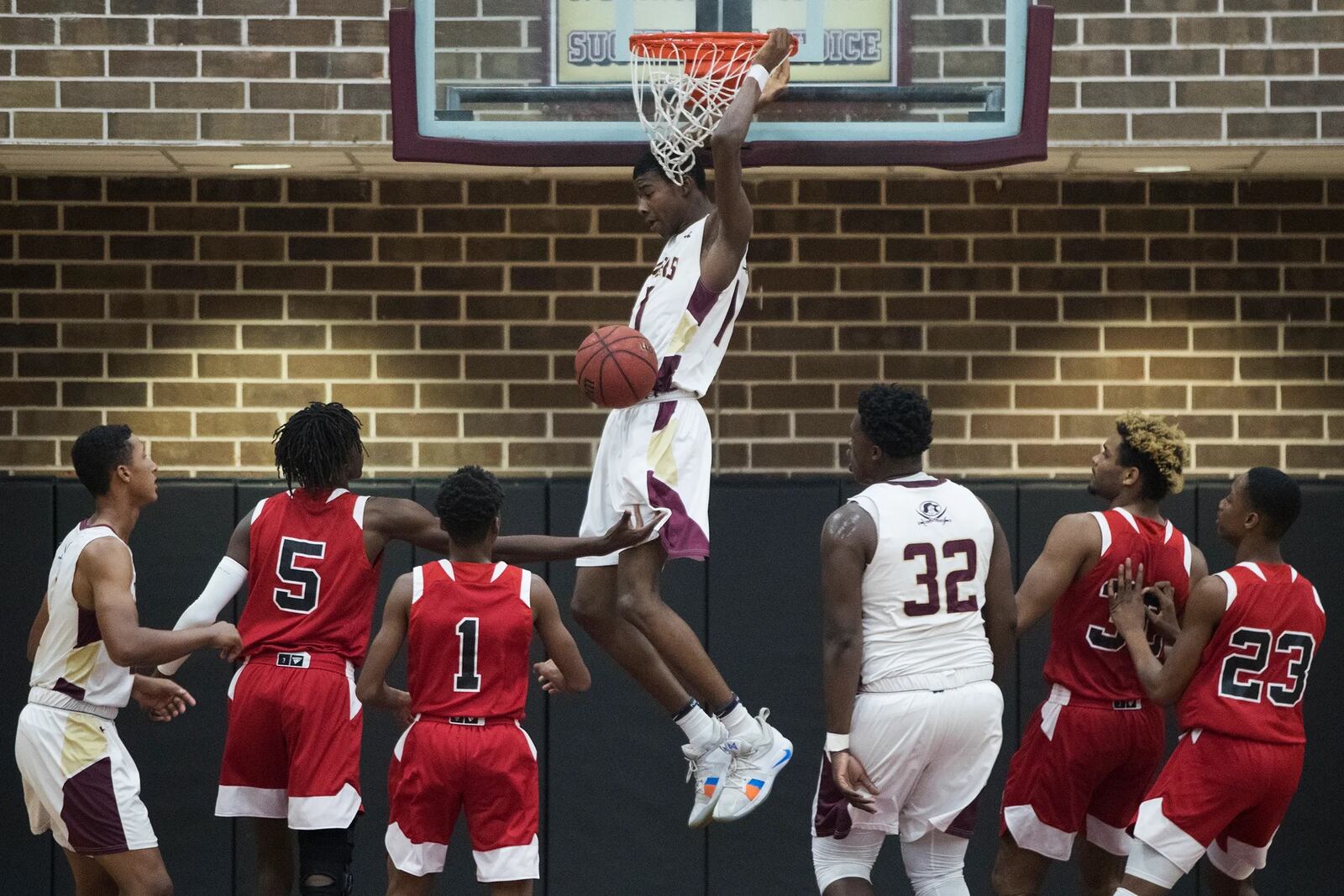 Tyrone Baker dunks for Riverdale High School in Fort Myers, Fla. Kinfay Moroti/The News-Press USA TODAY NETWORK — FLORIDA