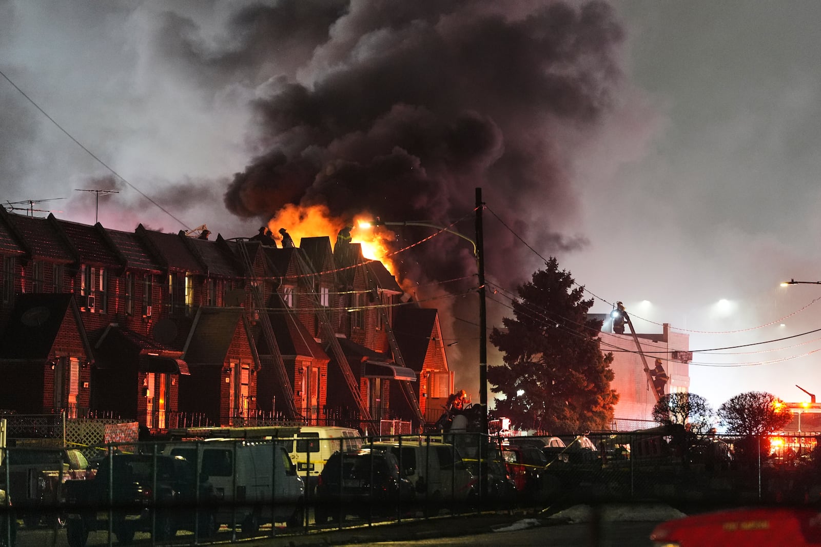 FILE - First responders work at the scene after a small plane crashed in Philadelphia, Friday, Jan. 31, 2025. (AP Photo/Matt Rourke, File)